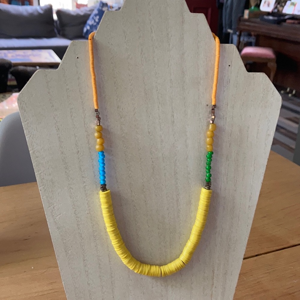 Handmade African vinyl beaded necklace.